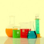 chemistry bottles with coloured liquid