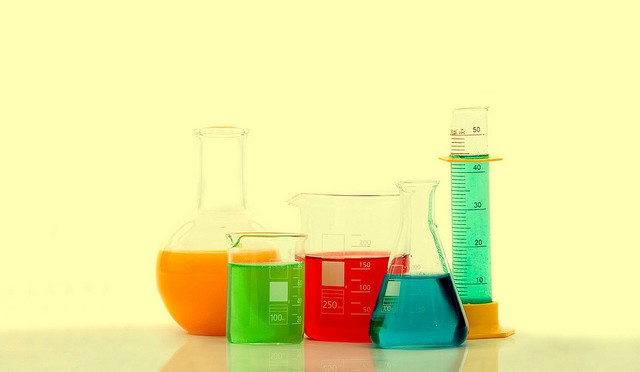 chemistry bottles with coloured liquid